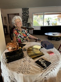a woman sitting at a table